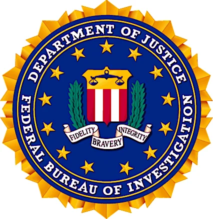 FBI(연방수사국)를 상징하는 배지 그림. 원형 테두리 안에 기관 문장이 들어 있다.